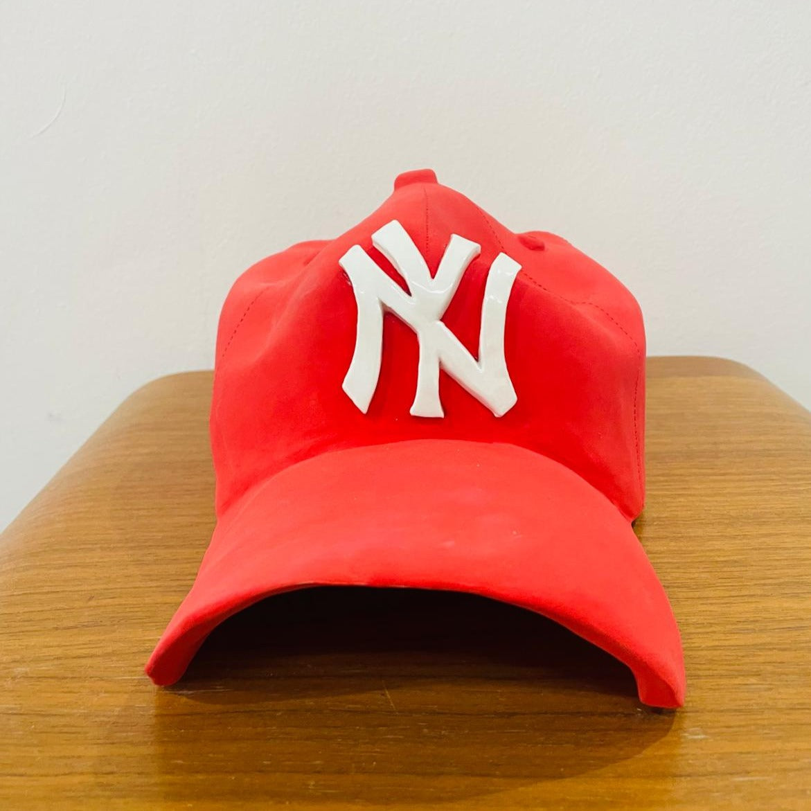 NY Yankees Ceramic Cap Sculpture (Red) - Figurative Sculpture