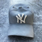 NY Yankees Ceramic Cap Sculpture (Grey) - Figurative Sculpture