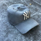 NY Yankees Ceramic Cap Sculpture (Grey) - Figurative Sculpture