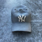 NY Yankees Ceramic Cap Sculpture (Grey) - Figurative Sculpture