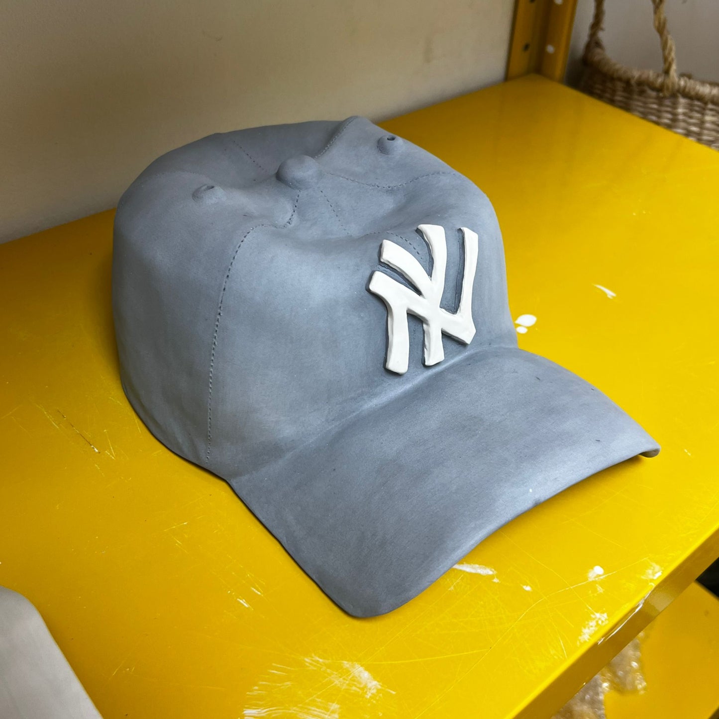 NY Yankees Ceramic Cap Sculpture (Grey) - Figurative Sculpture