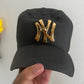 NY Yankees Ceramic Cap Sculpture (Black & Gold) - Figurative Sculpture