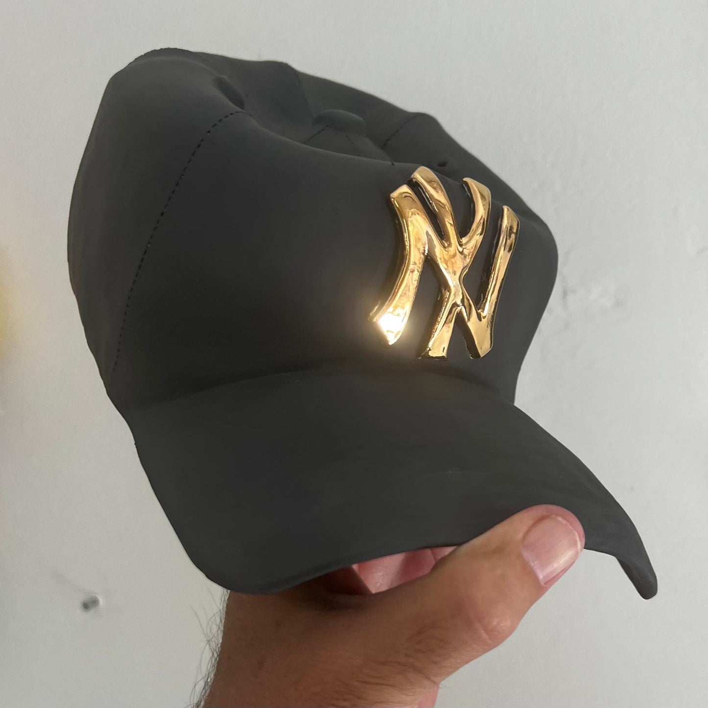 NY Yankees Ceramic Cap Sculpture (Black & Gold) - Figurative Sculpture