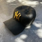 NY Yankees Ceramic Cap Sculpture (Black & Gold) - Figurative Sculpture