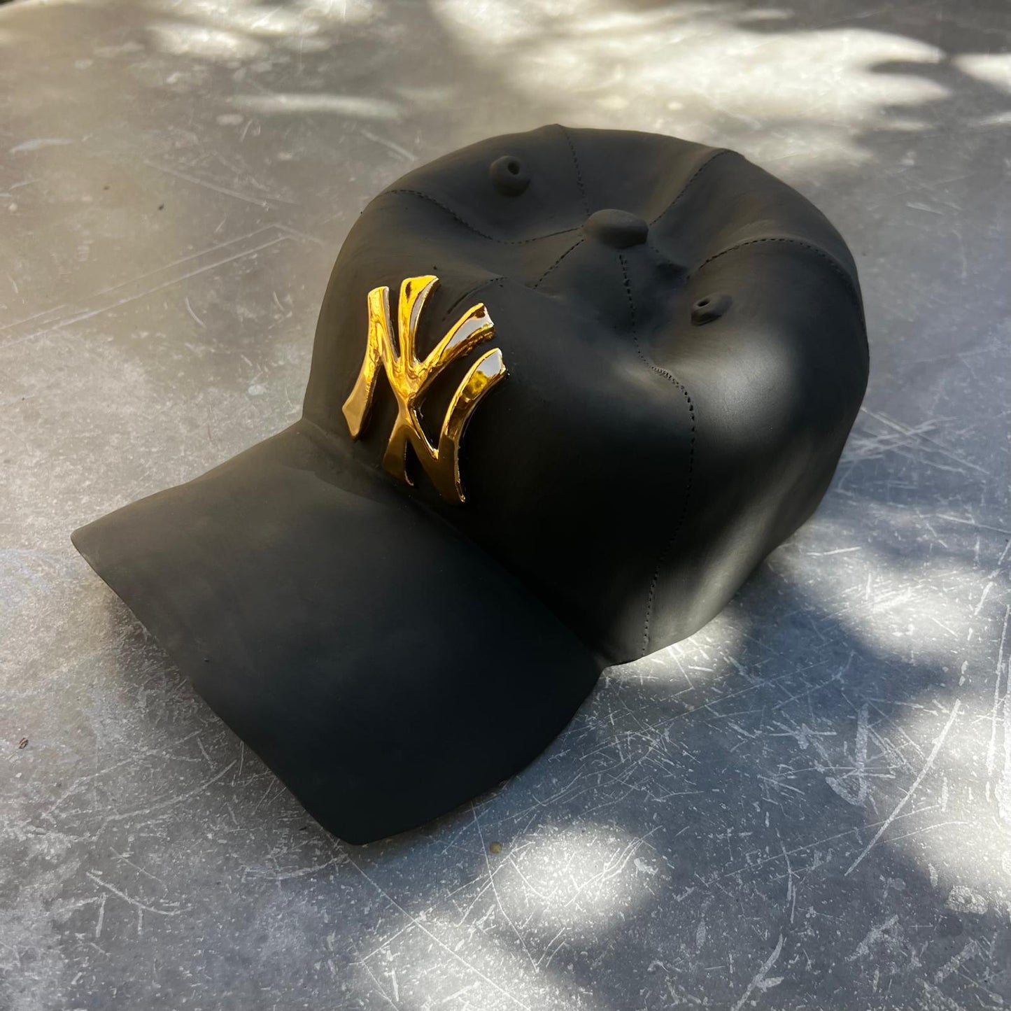 NY Yankees Ceramic Cap Sculpture (Black & Gold) - Figurative Sculpture