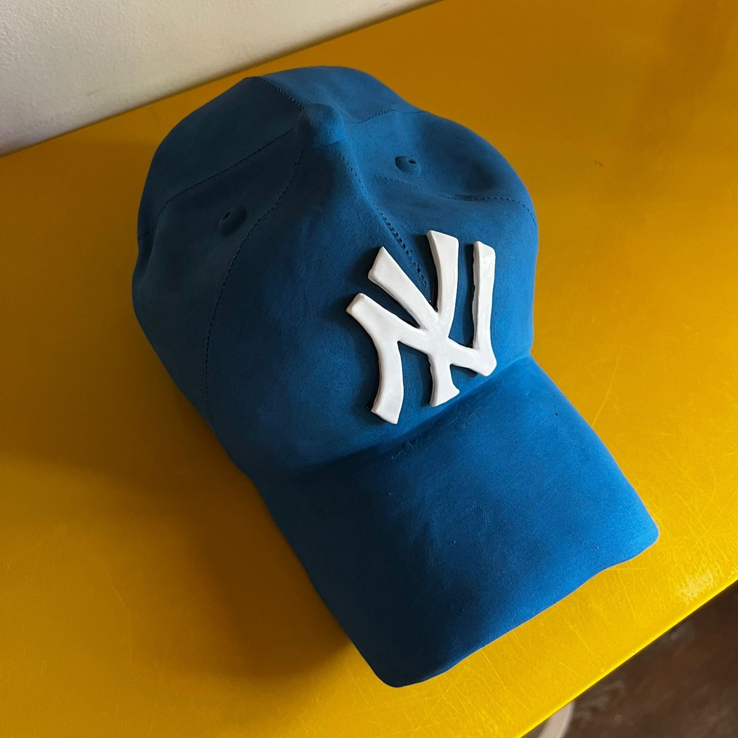 NY Yankees Ceramic Cap Sculpture (Blue) - Figurative Sculpture