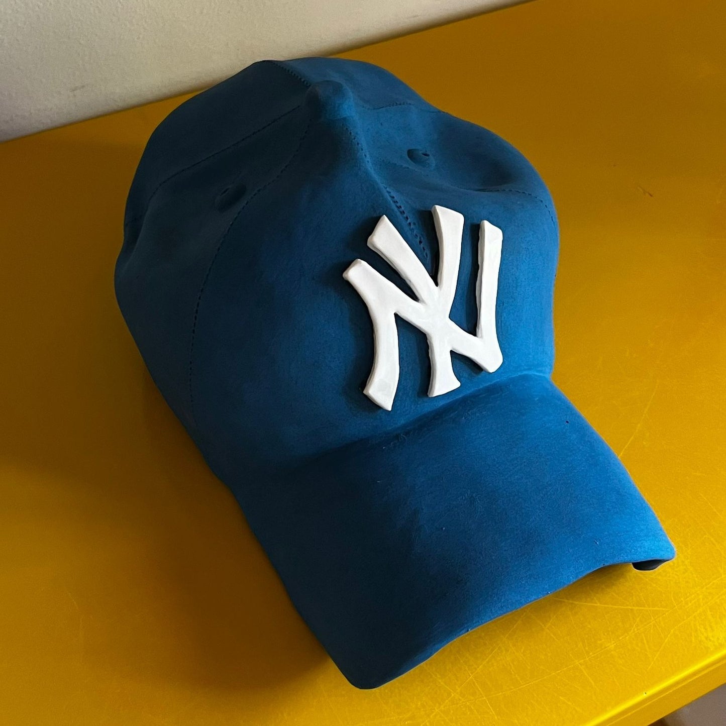 NY Yankees Ceramic Cap Sculpture (Blue) - Figurative Sculpture