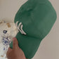 NY Yankees Ceramic Cap Sculpture (Green) - Figurative Sculpture